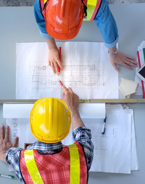 top-view-of-group-of-engineering-team-is-meeting-planning-construction-work